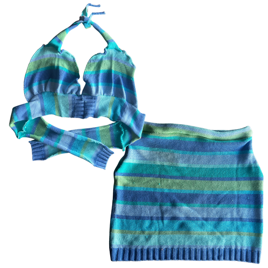 Blue and green striped bikini set on a white background