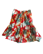 Sunset Tropics Upcycled Ruffle Skirt with bold floral print, showcasing colorful statement clothing for women.