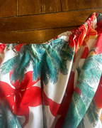 Close-up of the floral pattern on the Sunset Tropics Upcycled Ruffle Skirt, showcasing unique tropical design.
