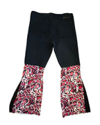 Venom Flare Remix Pants – One of a Kind Upcycled Statement Piece showcasing bold red snakeskin panels and dark denim.