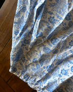 Blue Meadow Remix Set – One-of-a-Kind Handmade Skirt & Halter Top Set with blue floral print on ivory background.