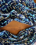Midnight Mirage Two-Piece Set – One-of-a-Kind Handmade Halter Top & Shorts Set showcasing a colorful geometric print in deep navy and turquoise.