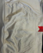 Ultra Remix Hoodie Set – One of a Kind Upcycled Statement Set close-up of fabric texture and pocket detailing.