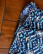 Midnight Mirage Two-Piece Set – One-of-a-Kind Handmade Halter Top & Shorts Set fabric detail in geometric navy and turquoise pattern.