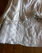Ghost Garden Skirt – One-of-a-Kind Handmade Upcycled Statement Piece showcasing soft, delicate textures and intricate lace details.