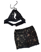 Celestial Chaos Two-Piece Set featuring a cosmic halter top and matching shorts, unique women's clothing.