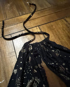 Close-up of the unique waistband and celestial print of the Celestial Chaos Two-Piece Set handmade clothing.