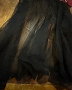 Black sheer skirt of the Betty in Paris Reworked Hoodie Dress showcasing its unique design.