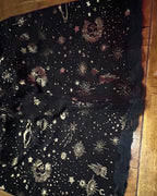 Celestial Chaos Two-Piece Set featuring celestial-print fabric with moons, stars, and planets, perfect for funky women's clothing.