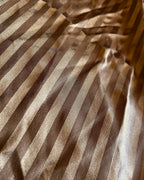Close-up of the soft champagne-taupe striped fabric used in Upcycled Champagne Stripe Lounge Pants.