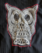 Embroidered owl appliqué on a pinstripe fabric from the Midnight Mischief Upcycled Two-Piece Set, showcasing unique women's clothing.