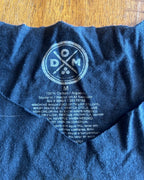 Care label of the Lucky 8 Reworked Leopard Tank, showcasing care instructions and fabric details.