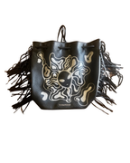 Alien After Dark Fringe Bag featuring hand-drawn alien design and dramatic black fringe, a unique statement purse.