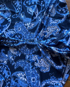 alt_tag: Close-up of the silky paisley print fabric in rich shades of blue for the 🛸 Midnight Tide Two-Piece Set – One of a Kind Handmade Statement Set.