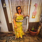 Woman in a vibrant Golden Hour Tropics Two-Piece Set, showcasing colorful women's clothing and handmade style.