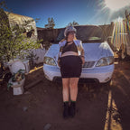 Model wearing Island Strings Fringe Crop Top in a colorful, funky outdoor setting with vintage car.