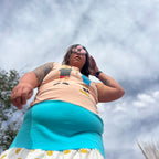 Woman wearing the Beavis & Butt-Head Smiley Tank Dress, showcasing unique women's clothing style outdoors.