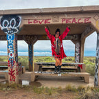 Crimson Bloom Babydoll Dress – One-of-a-Kind Handmade Upcycled Statement Piece worn in a vibrant graffiti setting.