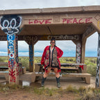 Crimson Bloom Babydoll Dress – One-of-a-Kind Handmade Upcycled Statement Piece worn in a vibrant, graffiti-adorned location.